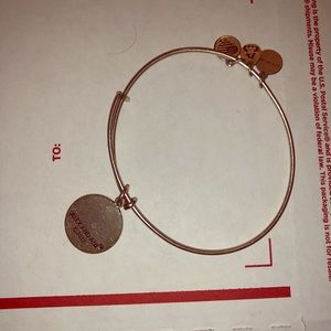 Alex and Ani bracelet with 4 separate charms